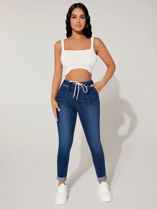 High-waisted slim jeans with drawstring and comfortable elastic waistband